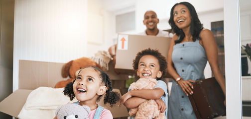 Family unpacking boxes with Oakley Relocation